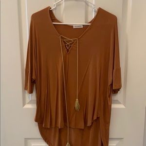 High low lace up top